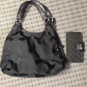 Authentic black Coach purse w/ matching wallet.