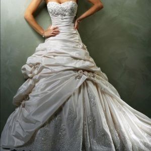 Couture modest long sleeve wedding gown