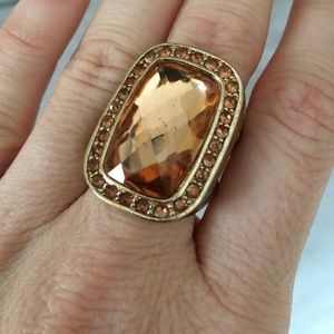 Large gold ring with rose gold color rhinestones