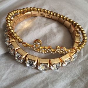 SET of gold and rhinestone bracelets