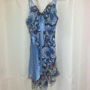 Bebe Funky Party lt blue shirt sM silk and flowy