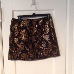 Black and gold mini skirt