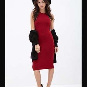 Black knee length dress.