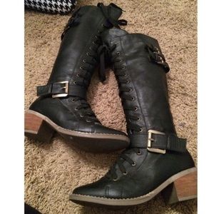 Black lace boots with heel.