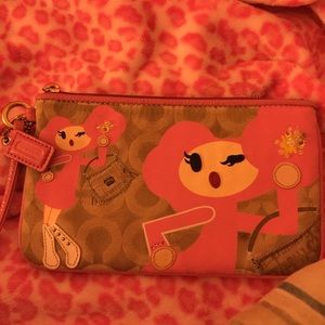 100% authentic coach clutch