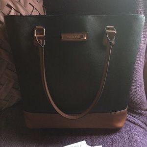 Black and brown Calvin Klein leather bag.