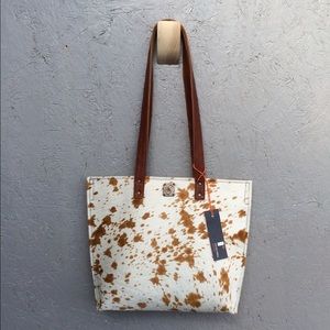 Hamdmade brindle hair-on leather tote.