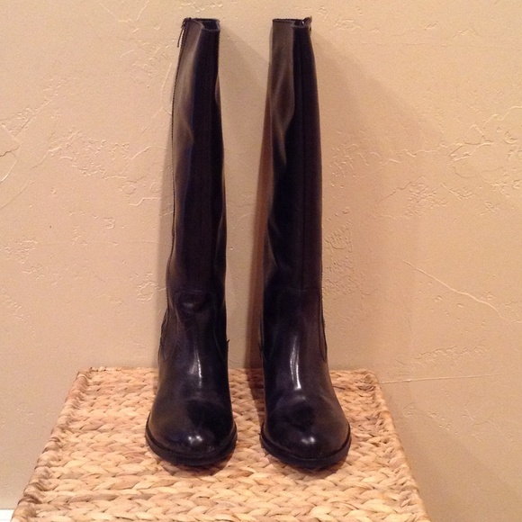 Black soft leather knee height boot.