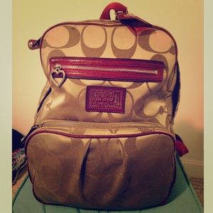 Gold and red coach backpack