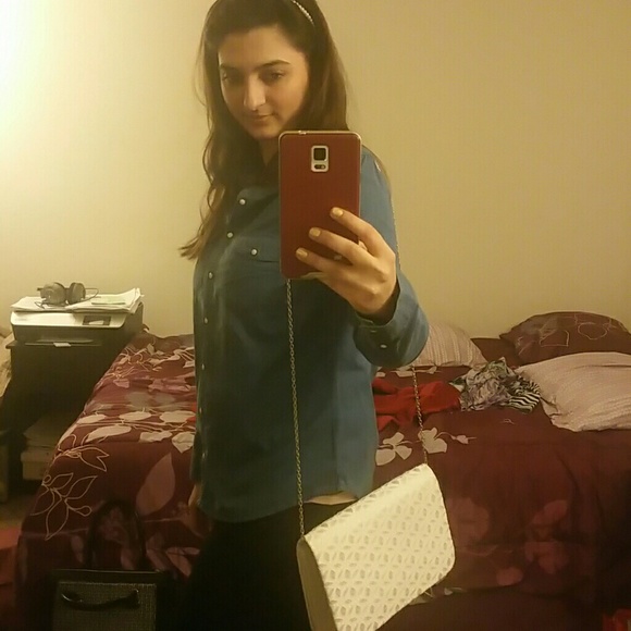 Off white clutch with cut out lace design