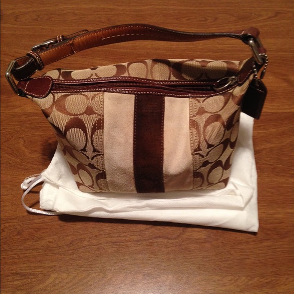 Coach Handbags - Mini coach bag ..