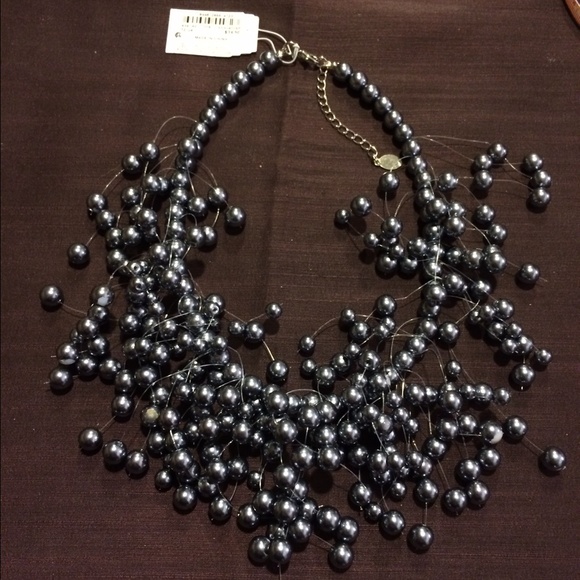 Gray pearls neckless .sold