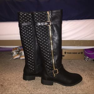 Black quilted riding boots