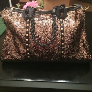 Black purse with gold sequins