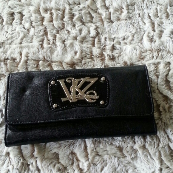 Kathy Van Zealand black clutch