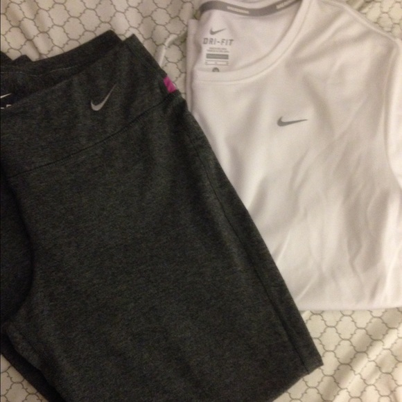 Nike yoga pants and a white Nike shirt.