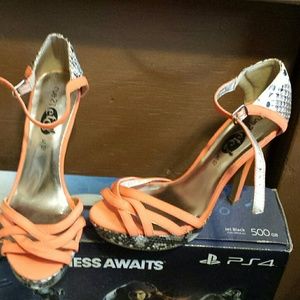 Snake print and neon orange heels