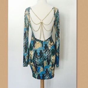 Snake skin print chain back bell sleeved dress