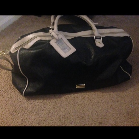 Steve Madden duffle bag. Used a few times.