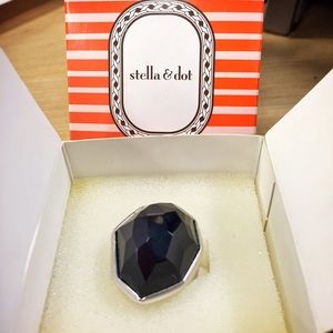 Size 7, silver and black ring.