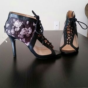 Laced up,  opened toed heels