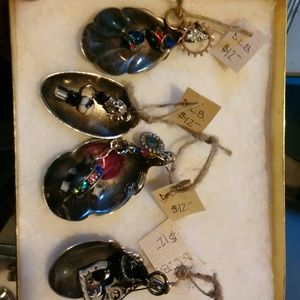 Set of four spoon pendants