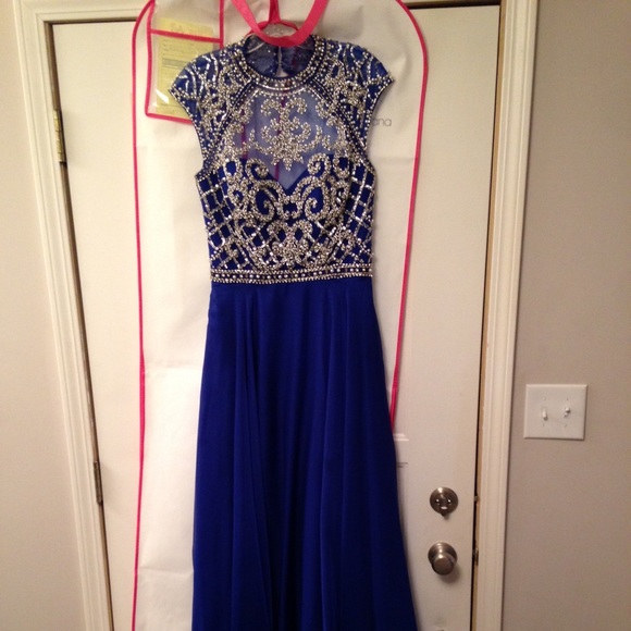 Beautifully beaded prom dress in Royal blue