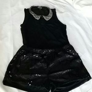 See through laced and bejeweled neckline