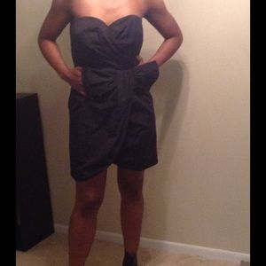 Black strapless cocktail dress.