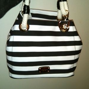 **Sold!** Mk Marina black n white striped