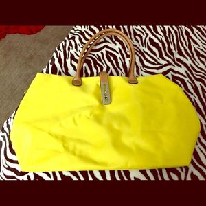 Large bright yellow duffle