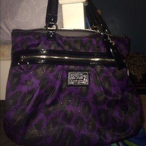 Real Coach Purple and Cheetah print purse.