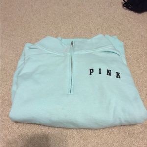 Light blue quarter zip jacket