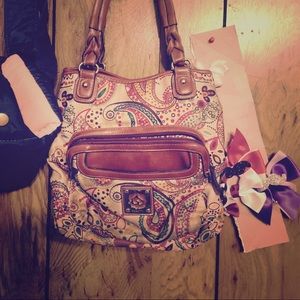 AuthenticRossetti double bag with over 15 pockets