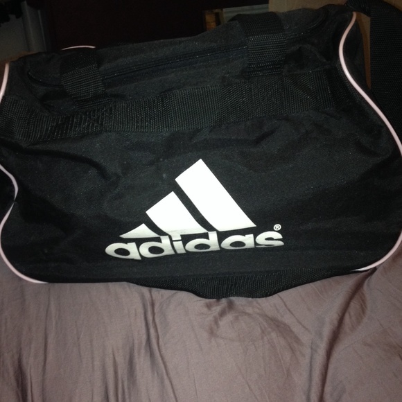 Black Adidas duffle bag with light pink lining