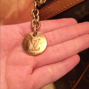Louis Vuitton Trivolli bag.
