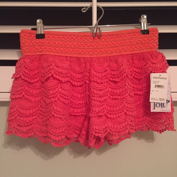 Orange ruffle shorts