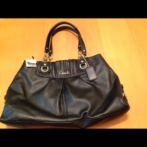 Coach black leather bag.It is Authentic .