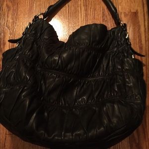 Black leather prada