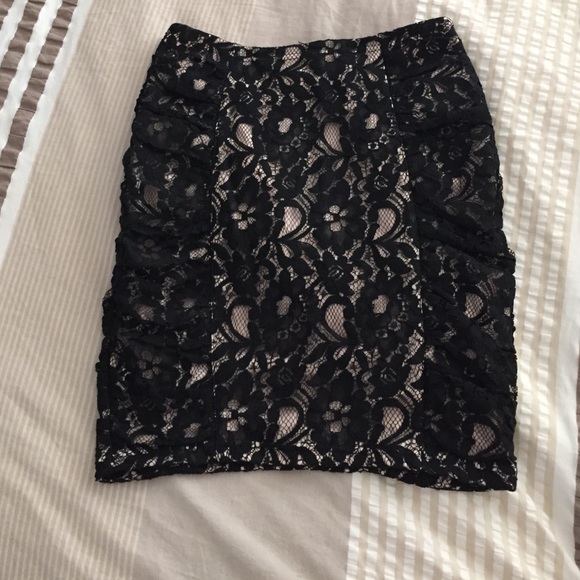 Lace blush and black skirt