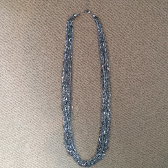 Gorgeous long silver layered statement necklace