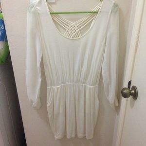 Long sleeve back baring white dress