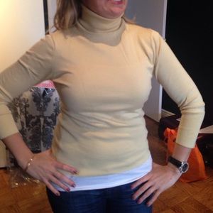 Yellow turtle neck three quarter sleeve sweater