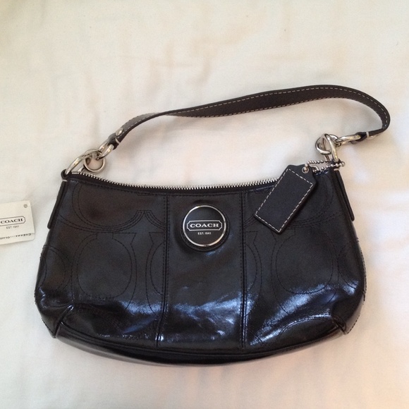 Coach purse with tag on