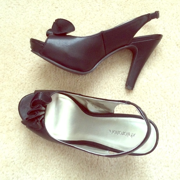 Black sling back heels with ruffle detail