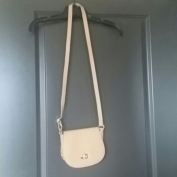 Tan crossbody with spikes