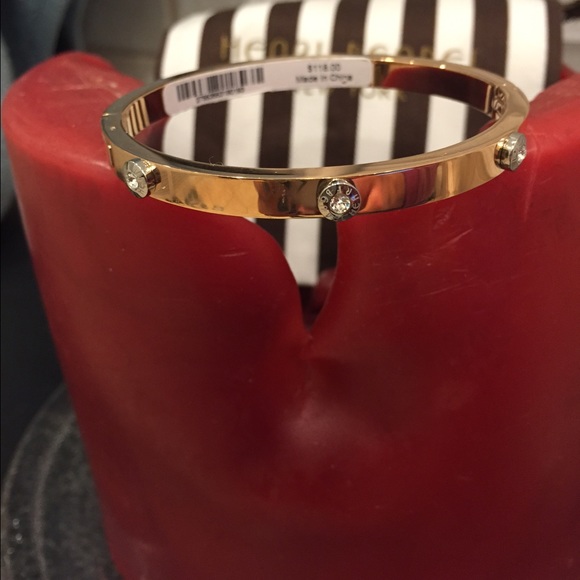 HENRY BENDEL GOLD PLATED SWAROVSKI RIVET BANGLE - Picture 2 of 4