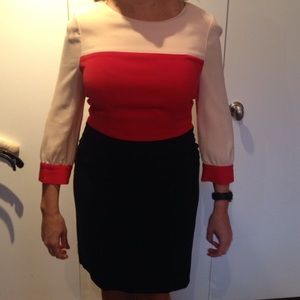 Pale pink, red, black dress