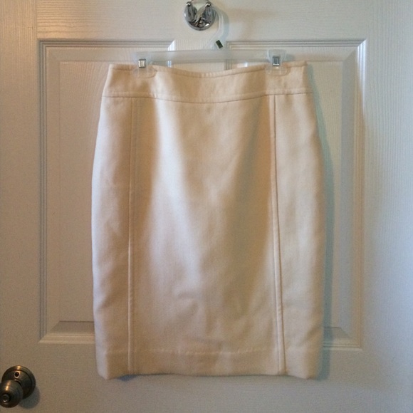 Wool skirt, bag and rain coat, black bag