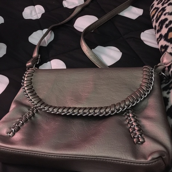 Charming Charlie's metallic silver cross body bag